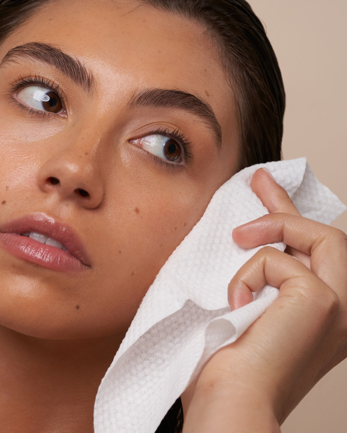a close up of a face cloth drying clean skin