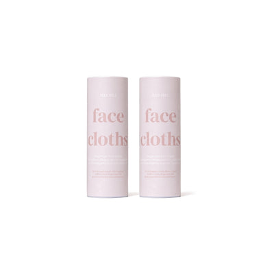 Two pink face cloths tubes, 30 single-use face towels in each